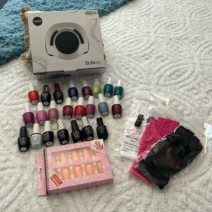 OPI Gel nail kit with 120W nail lamp.  16 colors, 3 base coats, 3 top coats.